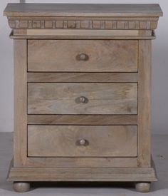 an old wooden dresser with four drawers