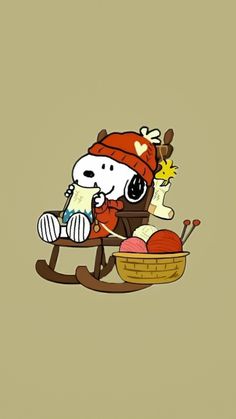 a cartoon dog sitting on top of a sled filled with apples and other items