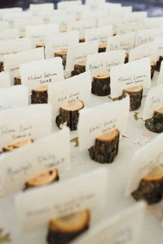 many pieces of wood with place cards on them