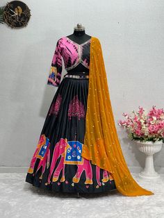 Rs.1250/- one colour.NEW DESIGNER *NAVRATRI SPECIAL* DIGITAL PRINT LEHENGAS CHOLI WITH REAL MIRROR DUPATTA #FABRIC DETAILS LEHENGA #LAHENGA FABRICS: SOFT BUTTER SILK WITH DIGITAL PRINT *(3 MTR FLAIR)* #LEHENGAS WORK : DIGITAL PRINTED WITH REAL MIRROR #LEHENGAS INNER : MICRO COTTON #SEMI STITCHED UP TO 44" SIZE CHOLI #CHOLI FABRICS : SOFT BUTTER SILK #CHOLI SIZE : UN STITCHED 1 MTR #CHOLI WORK : DIGITAL PRINT WITH REAL MIRROR WORK SLEEVES DUPATTA #DUPATTA FABRICS : HEAVY GEORGETTE WITH EMBR Navratri Georgette Dupatta With Floral Print, Floor-length Mirror Work Dupatta For Navratri, Navratri Georgette Fabric With Mirror Work, Navratri Floor-length Dupatta With Floral Embroidery, Navratri Maxi-length Dupatta With Mirror Work, Black Lehenga Choli, Navratri Festival, Black Lehenga, Festival Outfits Women