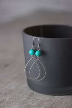 Lovely and simple drop earrings for everyday wear! Earrings was made from of turquoise stone 8 mm beads,dainty steel open drop charms, stainless steel earring hooks. Earring hooks are from nickel free and lead free metal. The total lenght of earrings is about 61 mm including earring hooks. Other earrings of my shop you can see here: https://www.etsy.com/shop/NaTavelli?section_id=13757927 Thanks for visit. Turquoise Wire Wrapped Beaded Earrings, Turquoise Teardrop Beaded Earrings For Gifts, Turquoise Teardrop Beaded Earrings As Gift, Bohemian Hypoallergenic Drop Earrings, Turquoise Drop Earrings With Ear Wire, Turquoise Wire Wrapped Teardrop Dangle Earrings, Handmade Turquoise Drop Jewelry, Bohemian Turquoise Teardrop Earrings For Jewelry Making, Turquoise Dangle Jewelry For Everyday