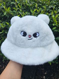 If your bias is Hyunjin, you NEED this. It's fluffy and therefore super soft and has the cutest little ears.  I also have these available for quokka and puppym! I also have a version of these available for the rest of skzoo without ears. I am actively working on finishing the rest of skzoo with ears! Cute Soft Hats Perfect As Gifts, Cute Soft Hats For Gifts, Cute Warm Hats One Size, Cute Soft Winter Hats, Cute White Hat, One Size, Cute White Bucket Hat, One Size, Cute Soft White Hat, Cute Warm Cat Ears Hat, Cute Adjustable Winter Bucket Hat