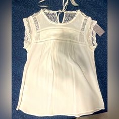 Brand: Danielrainn Size: Medium Cute White Blouse. Received In My Stitch Fix Box But Have Not Worn Out, Smoke Free, Pet Free Home New, Still Has Tags On It Spring Lace Top For Daywear, Flowy Lace Trim Tops For Daywear, Spring Flowy Lace Top, Flowy Lace Top Casual Summer Style, Casual Sleeveless Blouse With Lace Trim, Casual Flowy Sleeveless Blouse, Casual Summer Lace Top For Daywear, Casual Lace Top For Summer Daywear, Spring Lace Top Flowy Fit