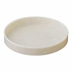 a white plate on a white background