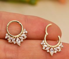 Septum Piercing On Women, Daith Piercing Styling, Pretty Septum Jewelry, Pretty Septum Piercing Jewelry, Gold Halo Septum Ring For Wedding, 14k Gold Halo Septum Ring, 14k Gold Septum Ring With Halo, 14k Gold Septum Ring With Halo Detail, Gold Hoop Piercings For Wedding