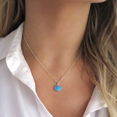 "This dainty little turquoise pendant is faceted and hung on a sterling silver or 14k gold filled satellite chain. It's a perfect gift for any turquoise lover! They make a great layering piece, but also looks perfect by itself! Shop Landon Lacey Jewelry » www.etsy.com/shop/landonlacey it's in the DETAILS . . . » Sterling silver or 14k gold filled satellite chain » Turquoise, 9x9mm » Spring ring clasp it's in the OPTIONS . . . » Select your length at checkout. The model is wearing this necklace a Dainty Turquoise Charm Necklace For Gift, Nickel Free Turquoise Charm Necklace For Gift, Turquoise Nickel-free Charm Necklace As Gift, Nickel-free Turquoise Charm Necklace Gift, Turquoise Sterling Silver Charm Necklace, Dainty Turquoise Round Pendant Jewelry, Dainty Blue Turquoise Pendant Necklace, Dainty Sterling Silver Turquoise Necklace, Dainty Sterling Silver Turquoise Necklace Gift