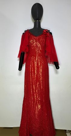 Silk, lame, hand beaded long gold and red evening dress. Decorated with flower on left shoulder. Size UK 8, can be measured on request. Gold Evening Dress For Holiday Gala, Elegant Festive Evening Dress For Red Carpet, Gold Evening Dress For Holiday, Gold Holiday Gown, Gold Holiday Gown With Sequins, Gold Sequin Holiday Gown, Holiday Gold Gown With Sequins, Red Festive Evening Gown, Gold Sequin Gown For The Holidays