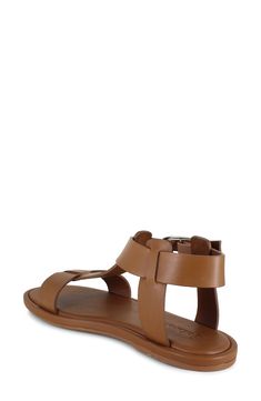 Easy casual style is the name of the game with this versatile sandal featuring smooth leather straps. Adjustable ankle strap with buckle closure Cushioned footbed Leather upper/synthetic lining and sole Imported Strap Sandals Women, Sandal Women, Ankle Strap Sandals, Strap Sandals, Smooth Leather, Cognac, The Game, Casual Style, Ankle Strap