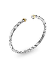 David Yurman’s artistic signature, Cable began as a bracelet that he hand-twisted from 50 feet of wire. For the past 30 years, he has evolved the twisted helix into a myriad of designs. Sterling Silver with 14-karat Yellow Gold • Bracelet, 4mm • Nitinol core to provide flex movement Artistic Signature, Yellow Gold Bracelet, Anniversary Bands, David Yurman, Helix, Ring Bracelet, Gemstone Colors, 30 Years, Wedding Bands