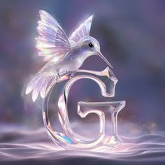 the letter g is made up of glass and has a bird on it's tail