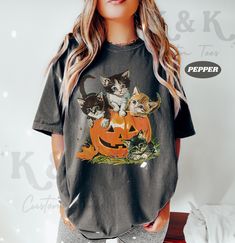 Vintage 90s Cat Halloween Shirt ⭐ Welcome to K & K Custom Tees! ⭐  - Indulge in pure comfort with our Comfort Colors Shirt. Soft, relaxed, and available in a variety of colors! ⭐SHIRT DETAILS⭐  -High Quality fabric  -100% ring-spun US cotton -Designed and printed in the USA  ⭐ PLEASE NOTE ⭐ -For an oversized look, we suggest to size up 1-2 sizes. These shirts run like standard unisex tees. Please see size chart for a more fitted look!  -Colors may vary based on your monitor or screen display! ⭐C Spooky Fall Tops With Cat Print, Spooky Cat Print Tops For Fall, Fall Cat Print Streetwear Top, Keyword Research, Cat Halloween, Pumpkin Shirt, Mens Long Sleeve Tee, Retro Halloween, Custom Tees