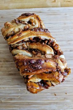 some kind of food that is sitting on a cutting board