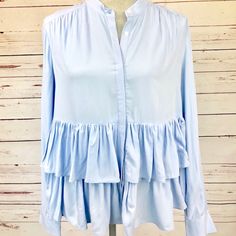 This Is A Beautiful Ruffle Blouse By Dr2 By Daniel Rainn In French Blue. It Has Flowy Ruffles At The Bottom And Buttons Down The Front. Size M All Items Come From A Smoke Free Home. Due To Variations In Cameras, Lighting, And Environment, Colors May Vary Slightly From The Photos. Please Review All Pictures And Feel Free To Ask Any Questions. Green Satin Top, Yoke Top, Paisley Print Blouse, Black Sheer Top, Lace Trim Top, Purple Accents, Embroidered Collars, Purple Shirt, Yellow Blouse