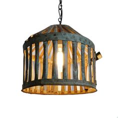 a light hanging from the ceiling with wood strips on it's caged design