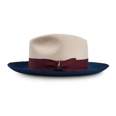 This European style wide brim fedora features:• 4 1/2" center dent crown.• 3" raw edge brim.• Finished with a premium roan leather sweatband, a 1 /2" ribbon and a satin lining.El Capo is a beautiful, wide-brimmed fedora that is equal parts elegance and style. With roots in European design, the El Capo can be the perfect accessory for a sharp-dressed night out on the town. El Capo comes in a wide range of colors combinations, including powder blue with a navy band, Bordeaux (burgundy), black, and Cedric The Entertainer, Felt Crown, Colors Combinations, Wide Brim Fedora, Straw Fedora, Felt Fedora, Hat Men, Perfect Sense, Men's Hats