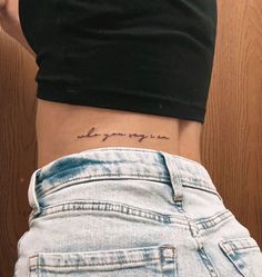 the back of a woman's stomach with an inscription on it that says, when you