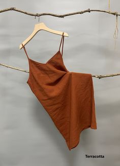 "Nothing welcomes the hot weather more than linen. This simple linen slip dress is a must have and can be more playful if layered. -100% linen construction -V neck -Slightly A-line shaped -Adjustable spaghetti straps -Above the knee -Slip on overhead Please provide your shoulder width, full bust measurement ( measured around the fullest part) and your height in the note to seller box. Don't see your size? Please message us for custom made order. -Fitting: Relaxed Taking Care: -Machine wash in co Linen Mini Dress For Daywear, Spring Linen Mini Dress With Straight Neckline, Linen Mini Dress With Straight Neckline For Spring, Spring Mini Dress In Linen With Straight Neckline, Summer Sundress Mini Dress With Camisole Shape, Summer Sundress With Camisole Shape, Spring Mini Dress With Straight Neckline In Linen, Beach Linen Sundress With Straight Neckline, Summer Camisole Mini Dress For Brunch