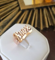 Christmas gift name ring in sterling silver or gold over silver is perfect statement ring for you. Use this modern name ring also as a knuckle ring (go one size smaller than your regular finger size) or as a Pinkie ring. Gold name ring comes as a desired word/phrase with a single or two separate rings. 1. Team name. 2. Group name. 3. Sports team name. 4. MEN NAME and many more....( contact me for more info) 5. A.K.A names. All my beautiful name rings and other pieces are proudly made in USA! **C Custom Nameplate Rings For Promise, Custom Name Nameplate Ring For Promise, Custom Nameplate Ring For Promise, Promise Ring With Custom Nameplate, Custom Name Plate Ring For Promise, Custom Name 14k Gold Rings For Personalized Gift, Custom Name Nameplate Rings As A Gift, Custom Nameplate Rings As A Gift, Personalized 14k Gold Rings With Custom Name