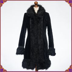 Absolutely magnificent faux fur coat! This rare piece is made from gorgeous black velvet. It is fully lined. It features hook closures and magical floral decorative details. Size SMALL ⫸ ❀ 100% VEGAN ❀ ⫸ AMAZING timeless design ⫸ Beautiful pre-loved  condition! Without any stains or odors . Some of the inside hook closures are different. Please see       the pictures ♡ Don't      hesitate to contact me if you would like to see more photos. ⫸ Ultra soft and cozy ⫸ Fully lined with soft polyester Bohemian Fitted Fur Coat For Winter, Fitted Bohemian Fur Coat For Winter, Bohemian Long Sleeve Fur Coat, Long Velvet Coat For Fall, Black Fur Coat With Feather Trim Long Sleeve, Black Long Sleeve Fur Coat With Feather Trim, Fitted Velvet Outerwear For Winter, Gothic Long Sleeve Velvet Outerwear, Bohemian Faux Fur Coat For Winter