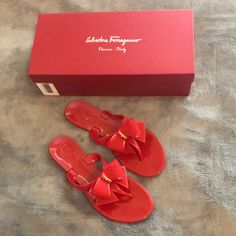 Impossible To Find, Never Worn, Pristine Condition, Salvatore Ferragamo Bali Red Jelly Sandals With Cute Bow And Gold Signature Ferragamo Detail In Center! Size 6. Get Ready For Spring/Summer! You Deserve It! Designer Patent Leather Flat Sandals, Elegant Flat Heel Sandals With Red Sole, Elegant Red Slip-on Sandals, Evening Sandals With Red Sole And Flat Heel, Elegant Red Sandals With Round Toe, Elegant Red Round Toe Sandals, Designer Patent Leather Sandals With Flat Heel, Summer Calf Leather Sandals With Red Sole, Open Toe Calf Leather Sandals With Red Sole