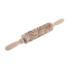 a wooden rolling pin with floral designs on it