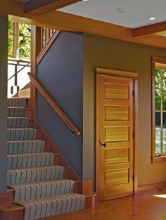 an image of a house with stairs in the middle and a door on the other side