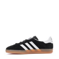 Once a training shoe and now a timeless icon, the adidas Gazelle is perfect for casual wear with its retro style. The suede upper and gum rubber outsole give it a classic look, while the contrast heel tab and 3-Stripes add a stylish touch. Whether strolling through the city or hanging out with friends, these shoes will have you looking sharp and feeling comfortable.Features: Regular fit. Lace closure. Suede upper for durability. Details: Gum rubber outsole. Imported. Classic Adidas Suede Sneakers, Suede Sneakers With Three Stripes Branding For Sports, Adidas Sneakers With Three Stripes And White Sole, Black Suede Adidas Sneakers, Adidas Suede Skate Shoes With White Sole, Adidas Leather Skate Shoes With Three Stripes, Adidas Suede Sneakers For Skateboarding, Adidas Low-top Skate Shoes With Contrast Sole, Adidas Suede Skate Shoes With Vulcanized Sole