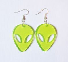 A pair of neon green alien earrings ♡ Each alien charm is 4cm  Comes with rubber earring backs Green Plastic Earrings For Gifts, Neon Yellow Drop Earrings As A Gift, Green Novelty Dangle Earrings, Green Fun Plastic Jewelry, Fun Green Plastic Jewelry, Fun Neon Earrings For Gifts, Adjustable Green Drop Plug Earrings, Green Hypoallergenic Novelty Earrings, Green Plastic Jewelry For Gifts