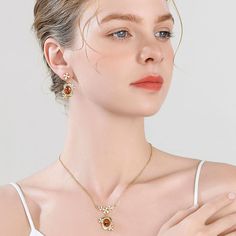 This Osmanthus Fragrans Pendant Necklace is an luxuriously exquisite piece. Handcrafted with beautiful enamel, it is an elegant accessory that will instantly upgrade any formal look. A timeless treasure, it is sure to become a cherished heirloom. DETAILS Plating: 18K Gold Materials: 18K Gold on Brass, Enamel, Artificial Gemstone Measurements: Length: 16.53"(42cm) + Extender: 2.56"(6.5cm) Weight: 13.7g Hypoallergenic design Ethereal Poetry, Osmanthus Fragrans, Neckline Details, Fruit Necklace, Everyday Wear Jewelry, Astrology Jewelry, Astrology Necklace, Moon And Star Earrings, Nature Earrings