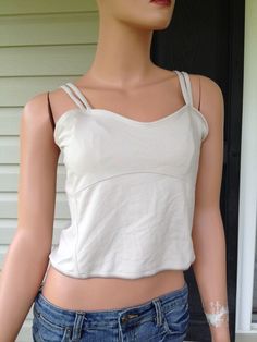 THIS TANK TOP IS NEW WITH TAGS!! NEVER WORN OUTSIDE, ONLY DISPLAYED IN A MAJOR DEPARTMENT STORE. PLEASE SEE ALL OF THE PICTURES BEFORE BIDDING! NEW BALANCE WOMEN'S DOUBLE STRAP TANK TOP NEW!! COLOR- TAN / BEIGE / OFF WHITE SIZE- MEDIUM  Support when you need it most. Feature double adjustable straps and built in shelf bra. Crop cut, sweetheart neckline. 90% polyester, 10% spandex Approximate measurements: bust 30", length (armpit to hem) 10" Please look at all pictures, use zoom option if needed Casual Crop Top With Built-in Bra And Medium Support, Fitted Beige Tops With Built-in Bra, Casual Tops With Built-in Bra And Spaghetti Straps, Trendy Tops With Built-in Bra And Spaghetti Straps, Casual Tank Top With Built-in Bra And Medium Support, Fitted Cami Tank Top With Built-in Bra, Y2k Tops With Spaghetti Straps And Built-in Bra, Trendy Tops With Built-in Bra And Medium Support, Beige Tank Top With Built-in Bra For Spring