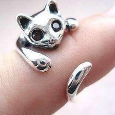 Say 'Hello' to your new little friend! This adorable cat ring wraps around your finger and will keep you company all day. His chic design with genuine black Austrian Crystal eyes and beautiful silky silver coat will surely get noticed with many compliments. This wrap-style ring is a standard size 7 and can be gently adjusted for better fit. Also makes a great thumb ring! Many other adorable animals available in our Animal Wrap Ring Collection Material: Platinum plated. Austrian crystal stones. S Cat Rings, Animal Wrap Rings, Silver Cat Ring, Chat Kawaii, Cheap Rings, Handmade Sterling Silver Rings, Sterling Silver Cat, Crystal Eye, Cat Ring