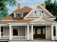 this is an artist's rendering of a house with porches and columns on the front