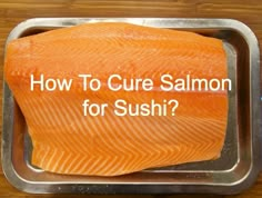 salmon on a tray with the words how to care salmon for sushi? in front of it