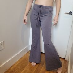 Lounge Around In A Trendy Pair Of Sweatpants Featuring A Flared Design. Runs Large, Order One Size Down. Super Soft Inside. Hidden Zipper Pocket Model Stats For Sizing: - Height: 5'5.5" - Bust: 37" - Waist: 28" - Hips: 34" Model Is Wearing Size S. - Lace-Up Closure - Eyelet Details - Flared Leg Xs 1=11.5" 2=10.5" 2b=11.5" 4=30" S 1=12.5" 2=11" 2b=14" 3=10.5" 4=31" 5=12.5" M 1=14" 2=12.25" 2b=15" 4=33" 78% Polyester, 14% Viscose, 8% Elastane Purple Cotton Bottoms For Fall, Purple Full Length Loungewear Pants, Fitted Mid-rise Purple Bottoms, Purple High Waist Cotton Pants, Purple Fitted Mid-rise Bottoms, Fitted Purple Mid-rise Bottoms, High Rise Purple Cotton Pants, Fitted Purple Loungewear Bottoms, Mid-rise Purple Cotton Pants