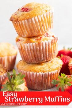 strawberry muffins stacked on top of each other with strawberries in the background