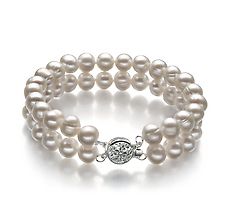 This double white pearl bracelet is the one you have been searching for!  Each pearl is carefully hand matched to create jewelry you will be proud to wear with any evening gown.  There is no single word that describes these white pearls.  Pearl size is 6 - 7 millimeters in diameter with a strong, brass double clasp for long and elegant wear.This beautiful A quality bracelet features outstanding AA luster, slightly off round AA shape and A body. Fine Pearl Jewelry, Cultured Pearl Bracelet, White Pearl Bracelet, Freshwater Pearl Jewelry, White Pearl Necklace, Freshwater Pearl Bracelet, Pearl Set, Sea Glass Jewelry, Ankle Bracelets