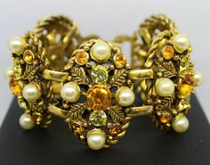 Bracelet Vintage very rare Delizza & Elster by JULIANA gold and topaz glass rhinestones and faux pearls. 1960 Condition: excellent Maybe one piece in the world .... Total length 18 cm. Face Fun, Topaz Bracelet, Trifari Brooch, Gold Topaz, Fun Hair, Vintage Bangles, Chanel Earrings, Vintage Bracelet, Glass Bracelet