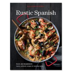 the cover of rustic spanish cookbook, featuring seafood and mussels in a skillet