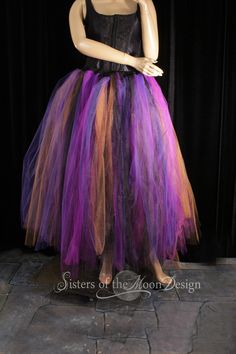 "The perfect tulle skirt for halloween or to wear all October! Makes for the perfect witch tutu for adults for halloween costumes. Made in XS to Plus size This tutu skirt is handmade from 100yards of 6\" strips of tulle in purple, dark purple, black and copper glimmer Bridal tulle. All tulle is then tightly machine gathered, sewn and sergered to the fabric covered elastic waistband. This tutu is fully sewn, it is not tied tulle. This tutu skirt is made to be around tea / calf length. Can be orde Tutu Halloween Costumes For Women, Fitted Tutu Dress For Halloween Dance, Halloween Fitted Tutu Dress For Dance, Halloween Costume Party Tutu Dress With Tulle Skirt, Halloween Tutu Dress For Costume Party, Halloween Party Witchy Skirt, Halloween Costume Party Tutu Dress, Tulle Skirt Witch Costume, Halloween Costume Tulle Skirt