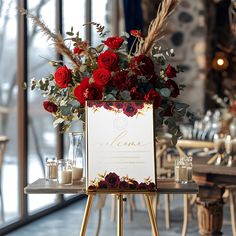 a table with flowers and candles on it