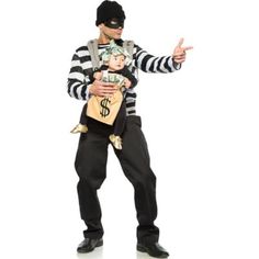 a man dressed as a mime holding a money bag