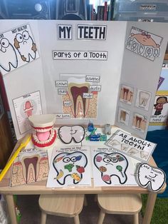 the table is set up with tooth pictures