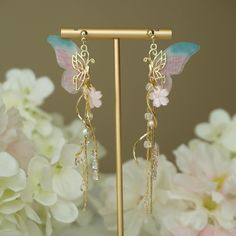 Fairy Wing Dangle Earrings, Fairycore Jewellery, Butterfly Earrings, Elegant Bridal Earrings, Fantasy Earrings, Statement Earrings Length:7 cm  width:2cm Pink Fairycore Earrings As Gift, Fairycore Pink Earrings As Gift, Fairycore Pink Earrings For Gifts, Fairycore Butterfly Earrings For Gift, Whimsical Gold Flower Earrings For Party, Gold Fairy Style Handmade Earrings, Handmade Gold Fairy Earrings, Gold Handmade Fairy Earrings, Handmade Fairycore Drop Earrings