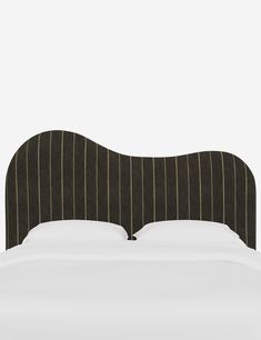 an upholstered headboard with pinstripe lines