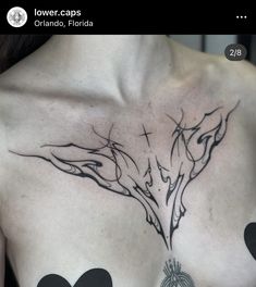 a man with a tattoo on his chest