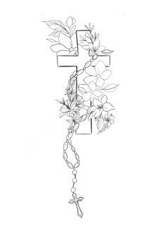 a cross with flowers and a rosary hanging from it's side on a white background