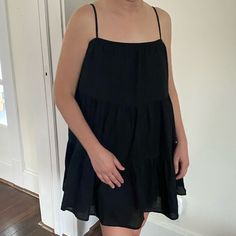 Airy Black Tiered Sun Dress. Great For A Casual Easy To Throw On Look. Size Small. Black Ruffled Mini Sundress, Black Mini Sundress With Ruffles, Chic Black Sundress For Casual Wear, Black Spaghetti Strap Mini Dress For Summer, Black Spaghetti Strap Summer Mini Dress, Black Summer Dresses For Daywear, Black A-line Sundress For Summer, Black Flowy Sundress In Casual Style, Black Flowy A-line Mini Dress