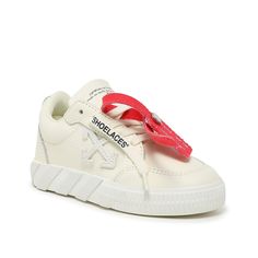 Off-White-Vulcanized Sneaker - Kids' These laidback kicks feature the effortless silhouette you know and love from Off-White. Decorated with geometric designs and the famous zip-tie detail, the Vulcanized sneaker is a must-have staple. About the Brand : When Virgil Abloh first released his fashion collection in 2012, he had no idea the legacy that would follow. Now, Off-White is taking the industry by storm thanks to its ironic "too cool to care" style loved by celebrities. Dare to reimagine str Modern White Sneakers With Logo-print Tongue, Modern White High-top Sneakers With Logo-print Tongue, Casual Sneakers With Logo-print Tongue And White Sole, White Low-top Skate Shoes With Logo-print Tongue, White High-top Sneakers With Logo-print Tongue, White Sneakers With Elastic Laces For Streetwear, White High-top Sneakers With Elastic Laces For Streetwear, Casual White Skate Shoes With Logo-print Tongue, White Casual Slip-on Sneakers With Elastic Laces