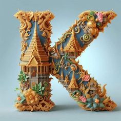 the letter k is made up of intricately carved wood and painted with colorful flowers