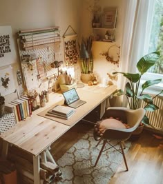 a room with a desk, chair and bookshelf filled with various items on it